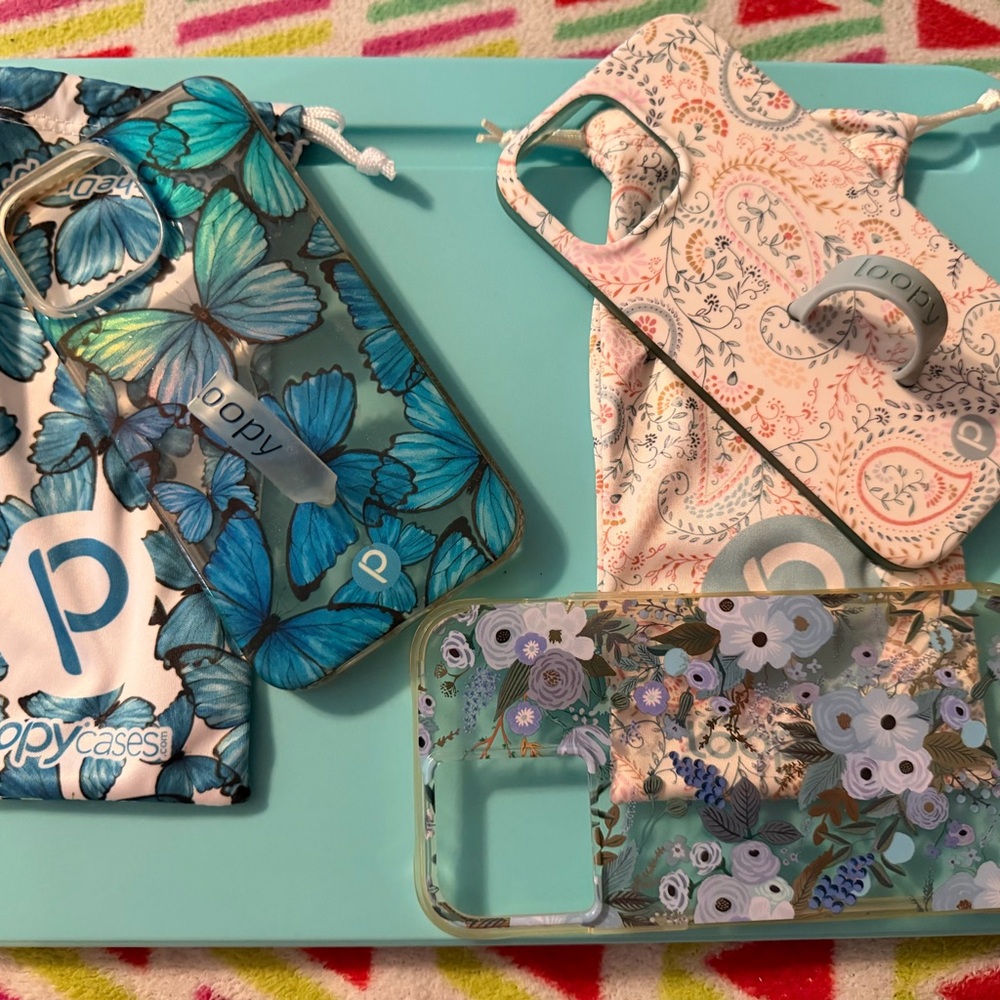 iPhone 13 Pro Max cases. 2 gently used Loopy Cases and 1 beautiful case.